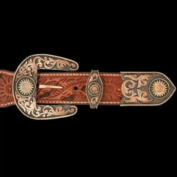 Our Santa Fe Three Piece Buckle Set is any cowgirl's dreams. Built on an antiqued, German Silver base, detailed with copper scrolls, and beautiful sunflowers. Pair it with a discount belt and keychain!